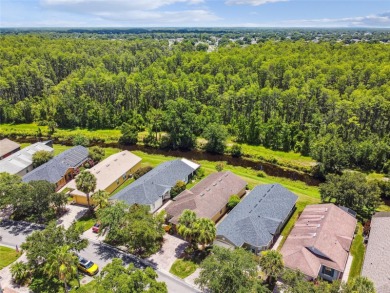 LOVELY 2 Bedroom, 2 Bath plus den BORDEAUX Model with CANAL and on Poinciana Golf Club in Florida - for sale on GolfHomes.com, golf home, golf lot