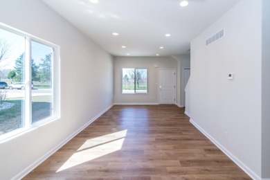New construction townhomes at the Emerald Hills Golf Course with on Alwyn Downs Golf Club in Michigan - for sale on GolfHomes.com, golf home, golf lot