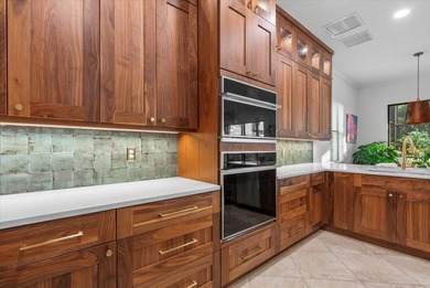 Under contract-accepting backup offers. This house has IT ALL!! on Esplanade Golf and Country at Lakewood Ranch in Florida - for sale on GolfHomes.com, golf home, golf lot