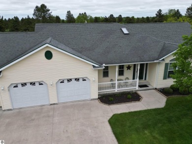 CHIC - ELEGANT - SPACIOUS!  Step into this warm and welcoming on The Pines Golf Course at Lake Isabella in Michigan - for sale on GolfHomes.com, golf home, golf lot