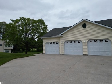 CHIC - ELEGANT - SPACIOUS!  Step into this warm and welcoming on The Pines Golf Course at Lake Isabella in Michigan - for sale on GolfHomes.com, golf home, golf lot