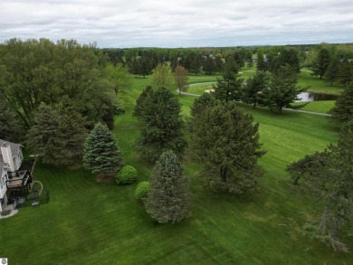 CHIC - ELEGANT - SPACIOUS!  Step into this warm and welcoming on The Pines Golf Course at Lake Isabella in Michigan - for sale on GolfHomes.com, golf home, golf lot