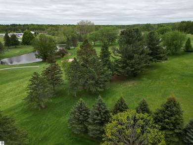 CHIC - ELEGANT - SPACIOUS!  Step into this warm and welcoming on The Pines Golf Course at Lake Isabella in Michigan - for sale on GolfHomes.com, golf home, golf lot