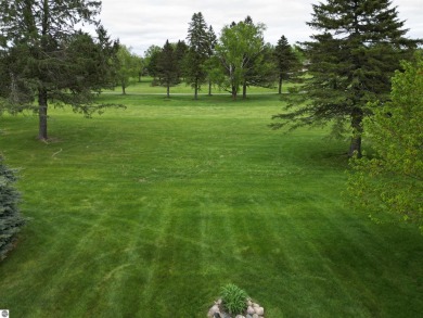 CHIC - ELEGANT - SPACIOUS!  Step into this warm and welcoming on The Pines Golf Course at Lake Isabella in Michigan - for sale on GolfHomes.com, golf home, golf lot