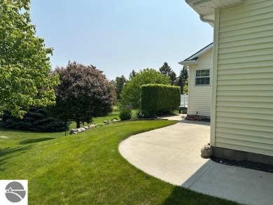 CHIC - ELEGANT - SPACIOUS!  Step into this warm and welcoming on The Pines Golf Course at Lake Isabella in Michigan - for sale on GolfHomes.com, golf home, golf lot