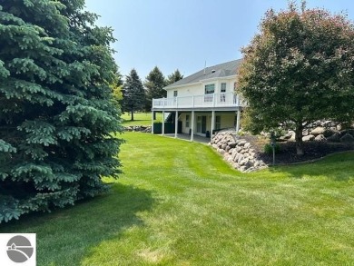 CHIC - ELEGANT - SPACIOUS!  Step into this warm and welcoming on The Pines Golf Course at Lake Isabella in Michigan - for sale on GolfHomes.com, golf home, golf lot
