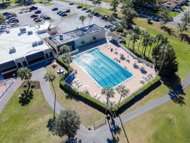 ABSOLUTELY STUNNING CONDO ON HOLE 17 TEE BOX WITH INCREDIBLE on Seven Springs Golf and Country Club in Florida - for sale on GolfHomes.com, golf home, golf lot