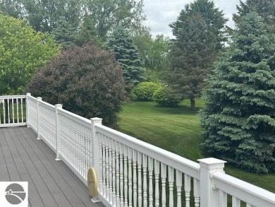 CHIC - ELEGANT - SPACIOUS!  Step into this warm and welcoming on The Pines Golf Course at Lake Isabella in Michigan - for sale on GolfHomes.com, golf home, golf lot