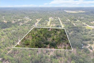 Escape to privacy and space with this 2017-built 3 bedroom, 2 on Pine Ridge Community Golf and Country Club in Florida - for sale on GolfHomes.com, golf home, golf lot