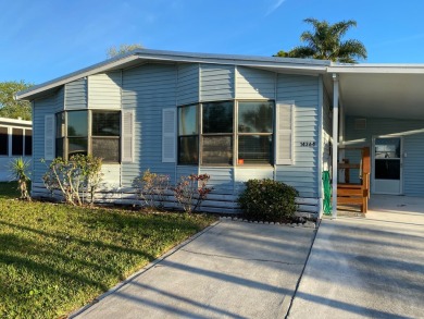 Cozy Open Concept mobile home in vibrant 55+ community on leased on Spanish Lakes Fairways in Florida - for sale on GolfHomes.com, golf home, golf lot