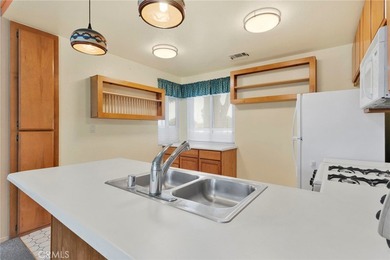 Enjoy golf course living in the heart of Silver Lakes! This home on Silver Lakes Golf Course in California - for sale on GolfHomes.com, golf home, golf lot