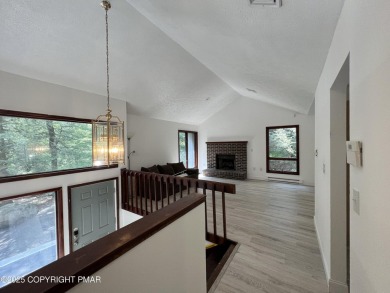 Located among a golf course, fishing spots and pools, tennis on Pocono Farms Country Club in Pennsylvania - for sale on GolfHomes.com, golf home, golf lot