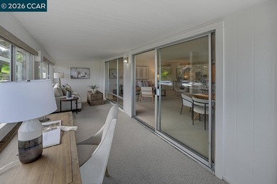 This beautiful Sequoia Wrap model offers lovely vistas, abundant on Rossmoor Golf Course in California - for sale on GolfHomes.com, golf home, golf lot