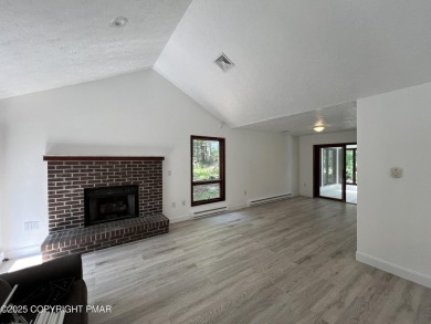Located among a golf course, fishing spots and pools, tennis on Pocono Farms Country Club in Pennsylvania - for sale on GolfHomes.com, golf home, golf lot