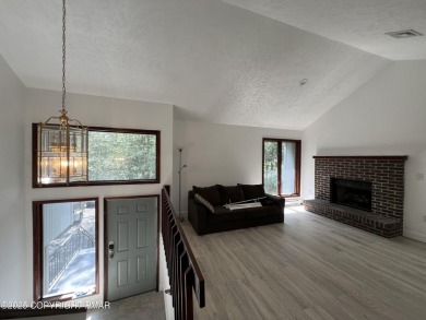 Located among a golf course, fishing spots and pools, tennis on Pocono Farms Country Club in Pennsylvania - for sale on GolfHomes.com, golf home, golf lot