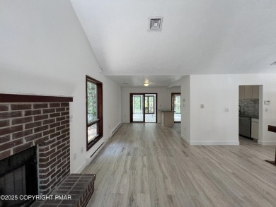 Located among a golf course, fishing spots and pools, tennis on Pocono Farms Country Club in Pennsylvania - for sale on GolfHomes.com, golf home, golf lot