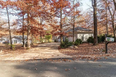 10' & 9' ceilings - sunroom vaulted with trapezoid windows on Cortez Golf Course in Arkansas - for sale on GolfHomes.com, golf home, golf lot