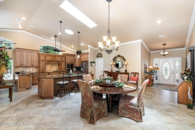 Enjoy luxury living with elegant indoor  outdoor features on Indian River Colony Club in Florida - for sale on GolfHomes.com, golf home, golf lot