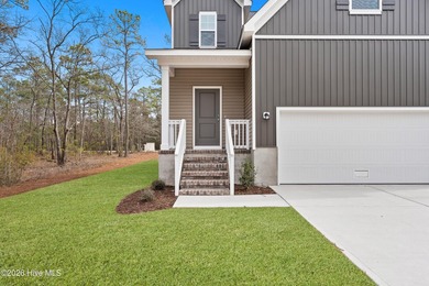 The Walker is a beautifully designed two-story home that blends on Harbour Point Golf Club in North Carolina - for sale on GolfHomes.com, golf home, golf lot