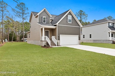 The Walker is a beautifully designed two-story home that blends on Harbour Point Golf Club in North Carolina - for sale on GolfHomes.com, golf home, golf lot