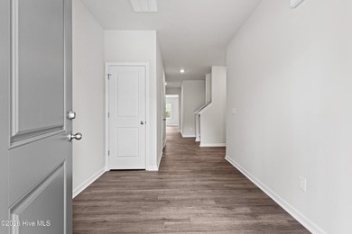 The Walker is a beautifully designed two-story home that blends on Harbour Point Golf Club in North Carolina - for sale on GolfHomes.com, golf home, golf lot