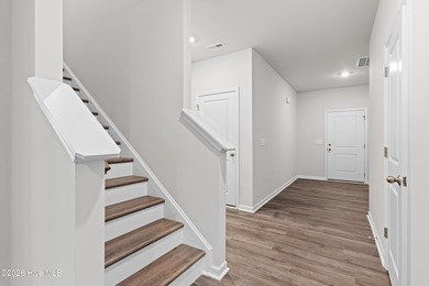 The Walker is a beautifully designed two-story home that blends on Harbour Point Golf Club in North Carolina - for sale on GolfHomes.com, golf home, golf lot