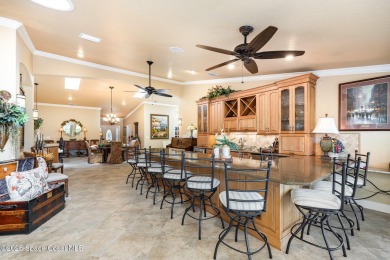 Enjoy luxury living with elegant indoor  outdoor features on Indian River Colony Club in Florida - for sale on GolfHomes.com, golf home, golf lot