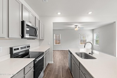 The Walker is a beautifully designed two-story home that blends on Harbour Point Golf Club in North Carolina - for sale on GolfHomes.com, golf home, golf lot