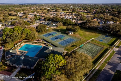 Tucked within the prestigious guard-gated Silverthorn Golf & on Silverthorn Country Club in Florida - for sale on GolfHomes.com, golf home, golf lot