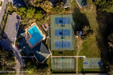 Tucked within the prestigious guard-gated Silverthorn Golf & on Silverthorn Country Club in Florida - for sale on GolfHomes.com, golf home, golf lot