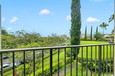 Step into lovely island living at 98-501 Koauka Loop #A207 in on Pearl Country Club in Hawaii - for sale on GolfHomes.com, golf home, golf lot