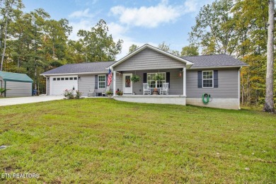 This stunning low-maintenance home is less than 3 years old and on Lake Tansi Village Country Club in Tennessee - for sale on GolfHomes.com, golf home, golf lot