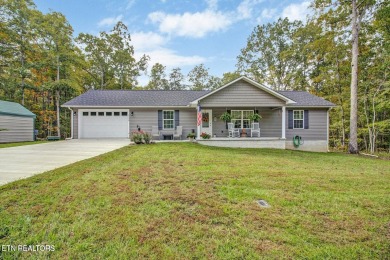This stunning low-maintenance home is less than 3 years old and on Lake Tansi Village Country Club in Tennessee - for sale on GolfHomes.com, golf home, golf lot