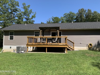 This stunning low-maintenance home is less than 3 years old and on Lake Tansi Village Country Club in Tennessee - for sale on GolfHomes.com, golf home, golf lot