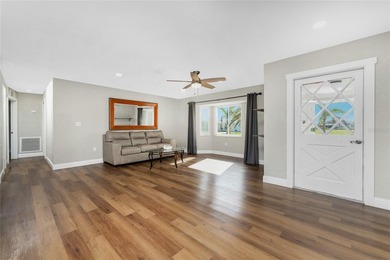 Exceptional Renovated Home Overlooking the Fairway in the on Rotonda Golf and Country Club The Hills Course in Florida - for sale on GolfHomes.com, golf home, golf lot