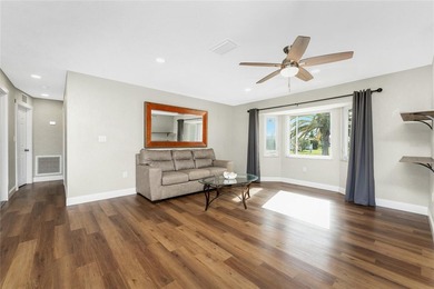 Exceptional Renovated Home Overlooking the Fairway in the on Rotonda Golf and Country Club The Hills Course in Florida - for sale on GolfHomes.com, golf home, golf lot