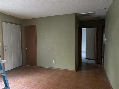 Welcome home to this inviting 3-bedroom, all-electric property on Cherokee Village South Course in Arkansas - for sale on GolfHomes.com, golf home, golf lot