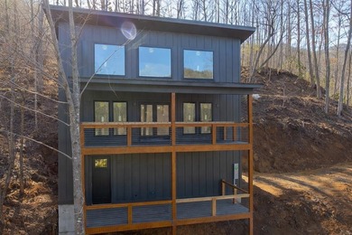 Wake up to mountain views and golf course scenery in this on Mill Creek Country Club in North Carolina - for sale on GolfHomes.com, golf home, golf lot