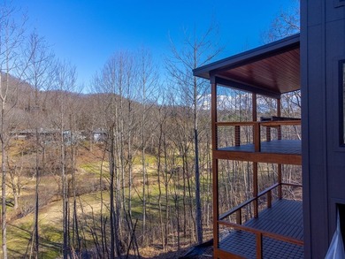 Wake up to mountain views and golf course scenery in this on Mill Creek Country Club in North Carolina - for sale on GolfHomes.com, golf home, golf lot