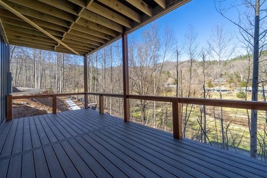 Wake up to mountain views and golf course scenery in this on Mill Creek Country Club in North Carolina - for sale on GolfHomes.com, golf home, golf lot