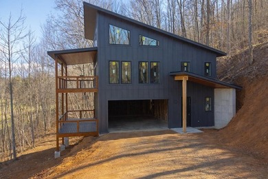 Wake up to mountain views and golf course scenery in this on Mill Creek Country Club in North Carolina - for sale on GolfHomes.com, golf home, golf lot