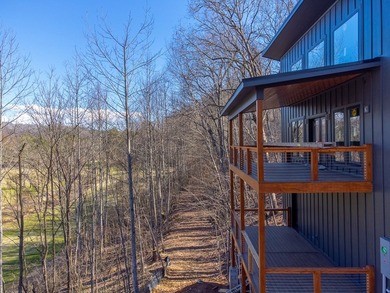 Wake up to mountain views and golf course scenery in this on Mill Creek Country Club in North Carolina - for sale on GolfHomes.com, golf home, golf lot