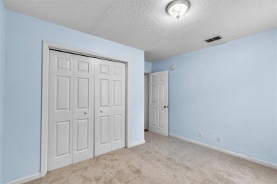 Discover serene golf course living in this beautiful home on Laurel Island Links in Georgia - for sale on GolfHomes.com, golf home, golf lot