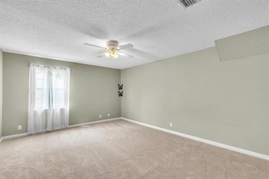 Discover serene golf course living in this beautiful home on Laurel Island Links in Georgia - for sale on GolfHomes.com, golf home, golf lot