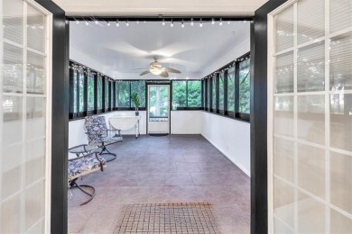 Discover serene golf course living in this beautiful home on Laurel Island Links in Georgia - for sale on GolfHomes.com, golf home, golf lot