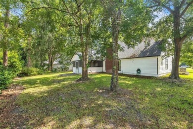 Discover serene golf course living in this beautiful home on Laurel Island Links in Georgia - for sale on GolfHomes.com, golf home, golf lot