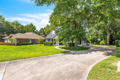 Discover serene golf course living in this beautiful home on Laurel Island Links in Georgia - for sale on GolfHomes.com, golf home, golf lot