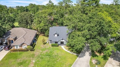 Discover serene golf course living in this beautiful home on Laurel Island Links in Georgia - for sale on GolfHomes.com, golf home, golf lot
