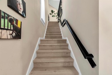 Immaculate corner residence with serene views of lush greenery on Weston Hills Country Club in Florida - for sale on GolfHomes.com, golf home, golf lot