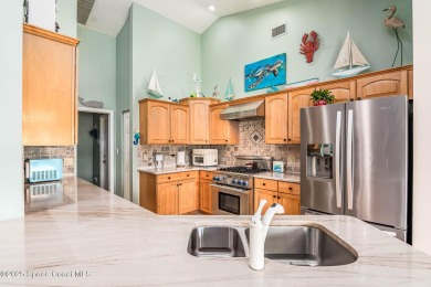 Lakefront Dream Home with Stunning Views & Thoughtful Upgrades on Baytree National Golf Links in Florida - for sale on GolfHomes.com, golf home, golf lot